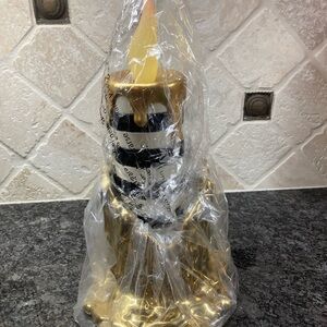 Mackenzie childs gold and black 13 inch Halloween candle last one 13 inches.